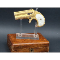 Catalogue Magasin LUXUEUX PISTOLET REMINGTON DOUBLE DERINGER Gravé Doré en COFFRET  Calibre 41RF RIMFIRE - US XIXè {PRODUCT_REFE
