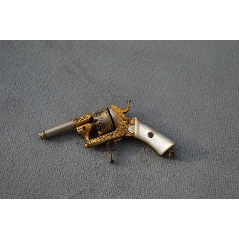 MINUSCULE REVOLVER BRELOQUE Calibre 2mm MINUSCULE REVOLVER BRELOQUE Calibre 2mm